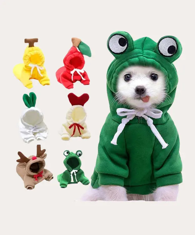 Dog wearing a green frog costume with various other costumes displayed on a white background