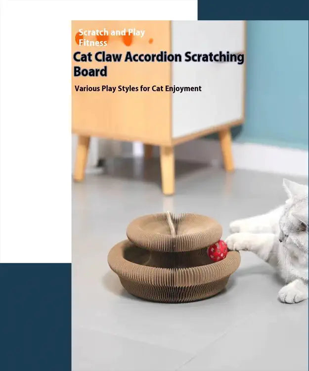 Cat claw accordion scratching board with a cat playing with it on a light gray floor.