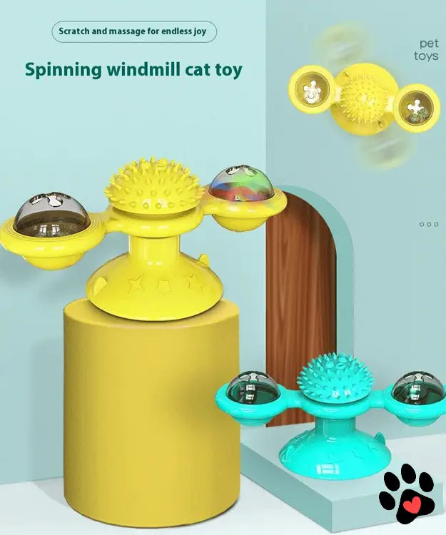 Spinning windmill cat toy with text on a light blue background
