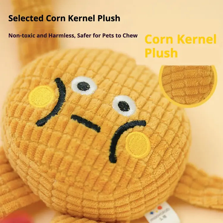 Corn kernel plush toy with a smiling face on a beige background