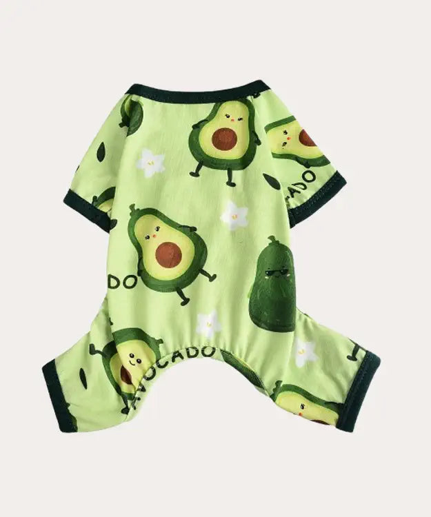 Green baby romper with avocado print on a light gray background