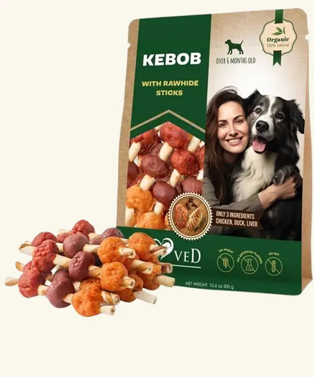 KEBOB dog treat package with rawhide sticks and a woman holding a dog on a white background