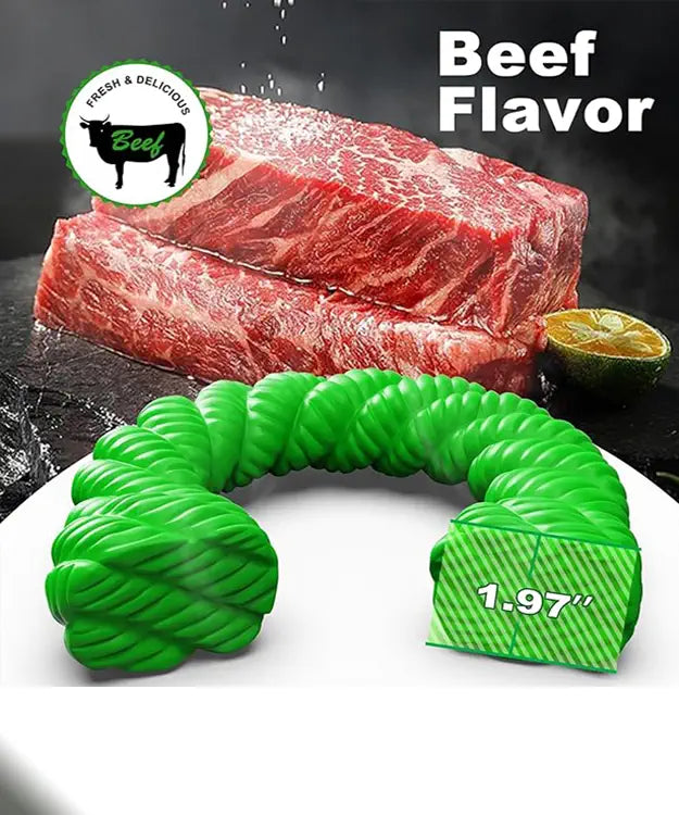 Green dog toy with beef flavor text and raw beef on a dark background